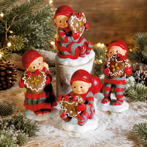 Baby elf with gingerbread heart