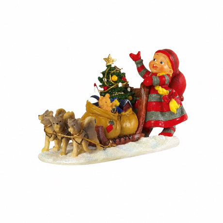 Baby elf with sled dogs