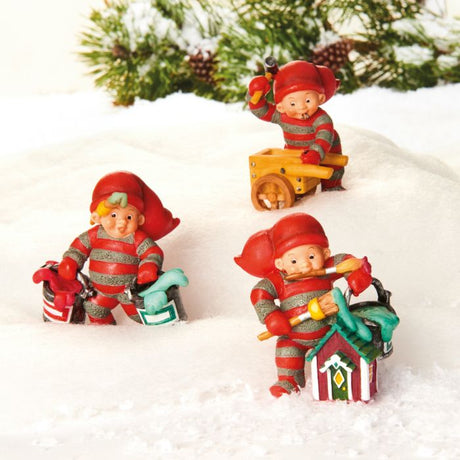 Baby elf prepares Christmas gifts