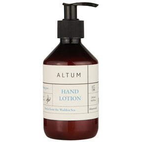 ALTUM Golden Grass hand lotion from Ib Laursen in a brown pump bottle with black pump and cream-colored label, 250 ml