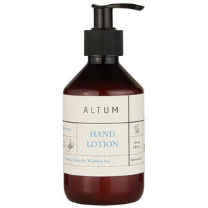 ALTUM Golden Grass hand lotion from Ib Laursen in a brown pump bottle with black pump and cream-colored label, 250 ml