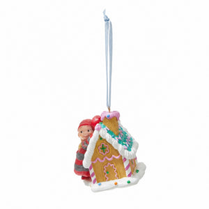 BABY ELF ON A GINGERBREAD HOUSE