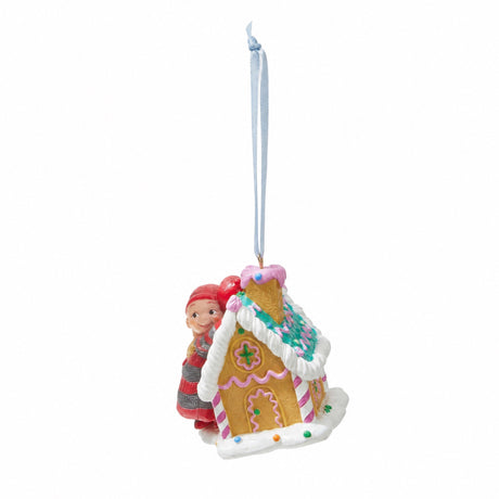 BABY ELF ON A GINGERBREAD HOUSE