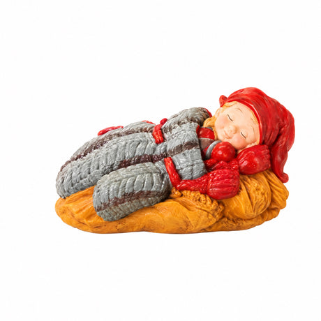 Baby elf sleeping in shoes / mittens