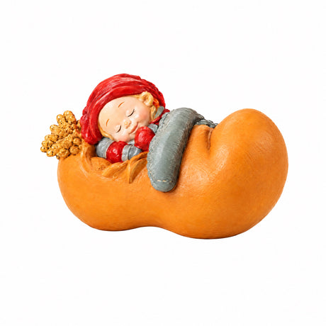 Baby elf sleeping in shoes / mittens