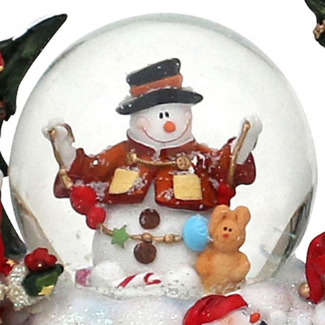 Snow globe with Santa Claus in the snow