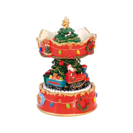 Julekarrusel med julemanden i juletog, der drejer rundt og spiller julemelodi fra Musicboxworld. 