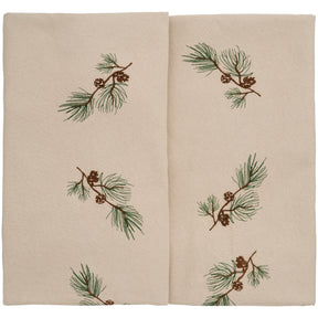Linen-colored rectangular tablecloth with a row of pine branches and cones from Ib Laursen