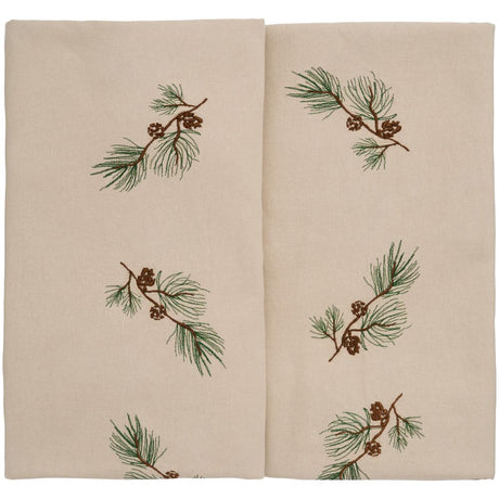 Linen-colored rectangular tablecloth with a row of pine branches and cones from Ib Laursen