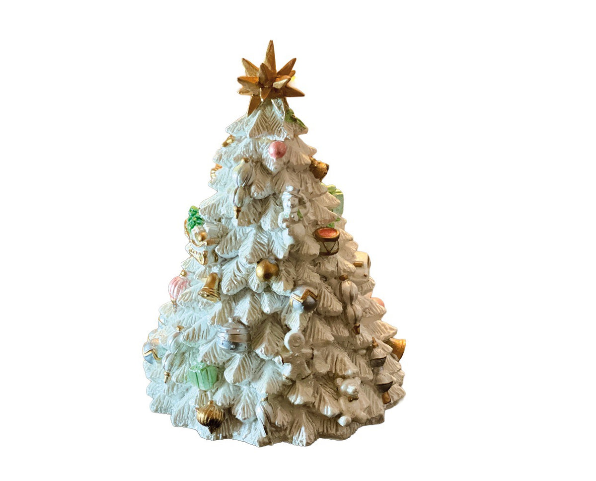 Music box with a winter-white Christmas tree from Musicboxworld, featuring snow-covered fir branches, gold-colored ornaments and a golden Christmas star