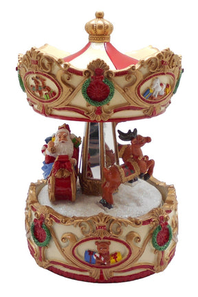 Christmas carousel from Musicboxworld with Santa in a sleigh, reindeer, snow, and a cream-colored roof with red and gold ornaments