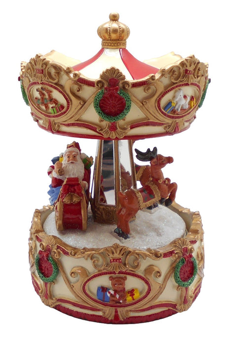 Christmas carousel from Musicboxworld with Santa in a sleigh, reindeer, snow, and a cream-colored roof with red and gold ornaments