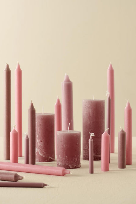 Rustic candles in various sizes in mauve pink from Ib Laursen