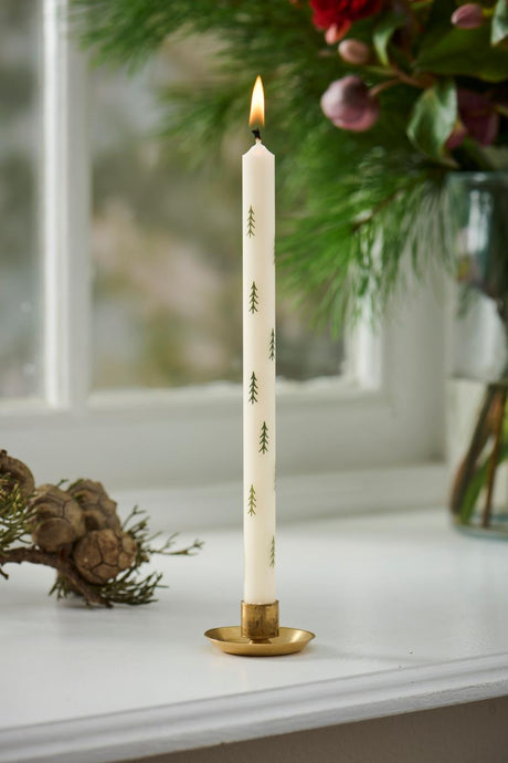 Candles with Christmas tree motifs in a brass candle holder from Ib Laursen