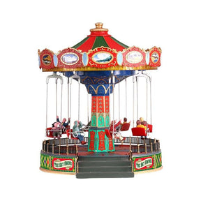 Himmelkarrusellen The Sky Swing med børn i gynger, der drejer rundt med musik fra Lemax. 