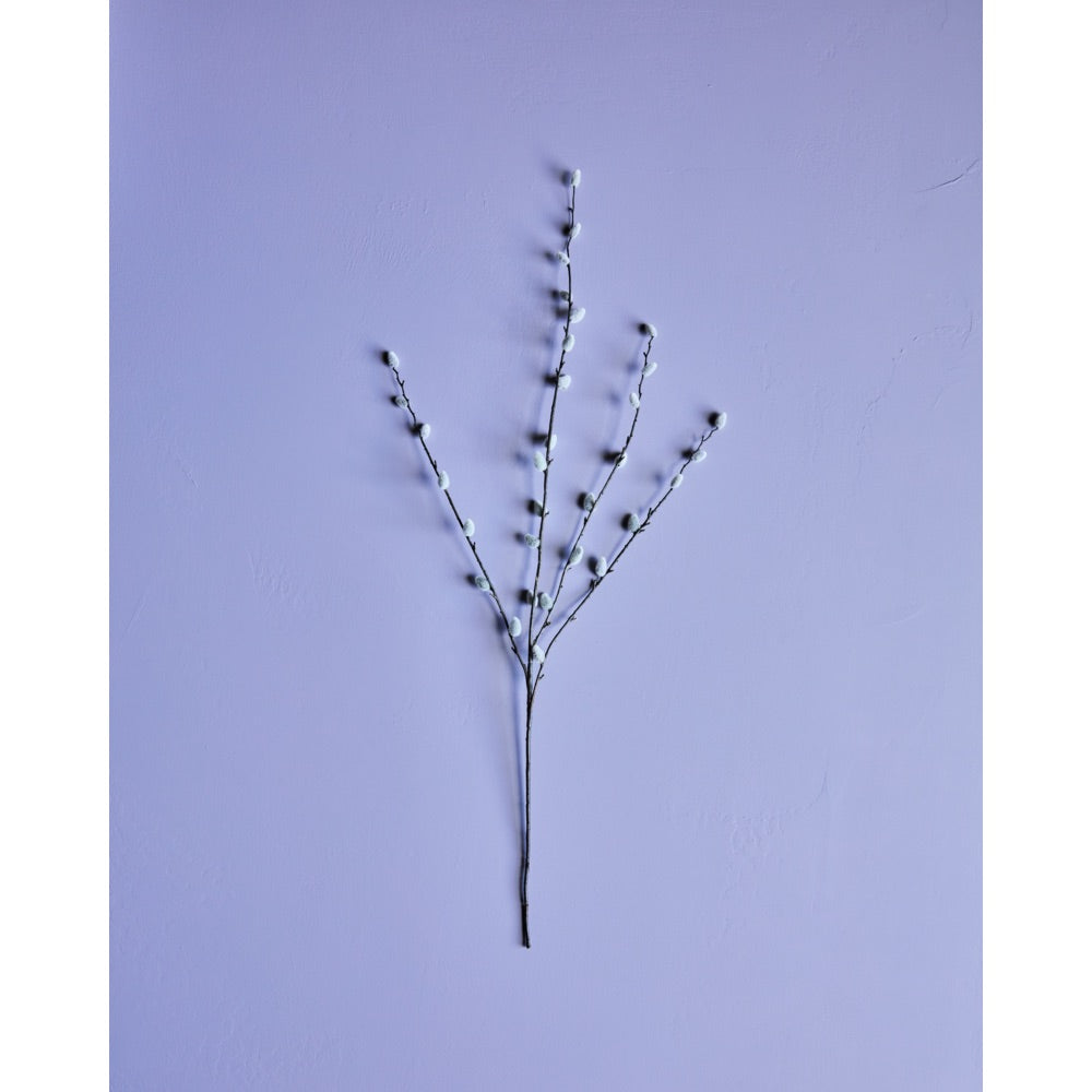 Kunstig gæslingegren fra House Doctor på lilla baggrund