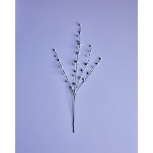 Kunstig gæslingegren fra House Doctor på lilla baggrund