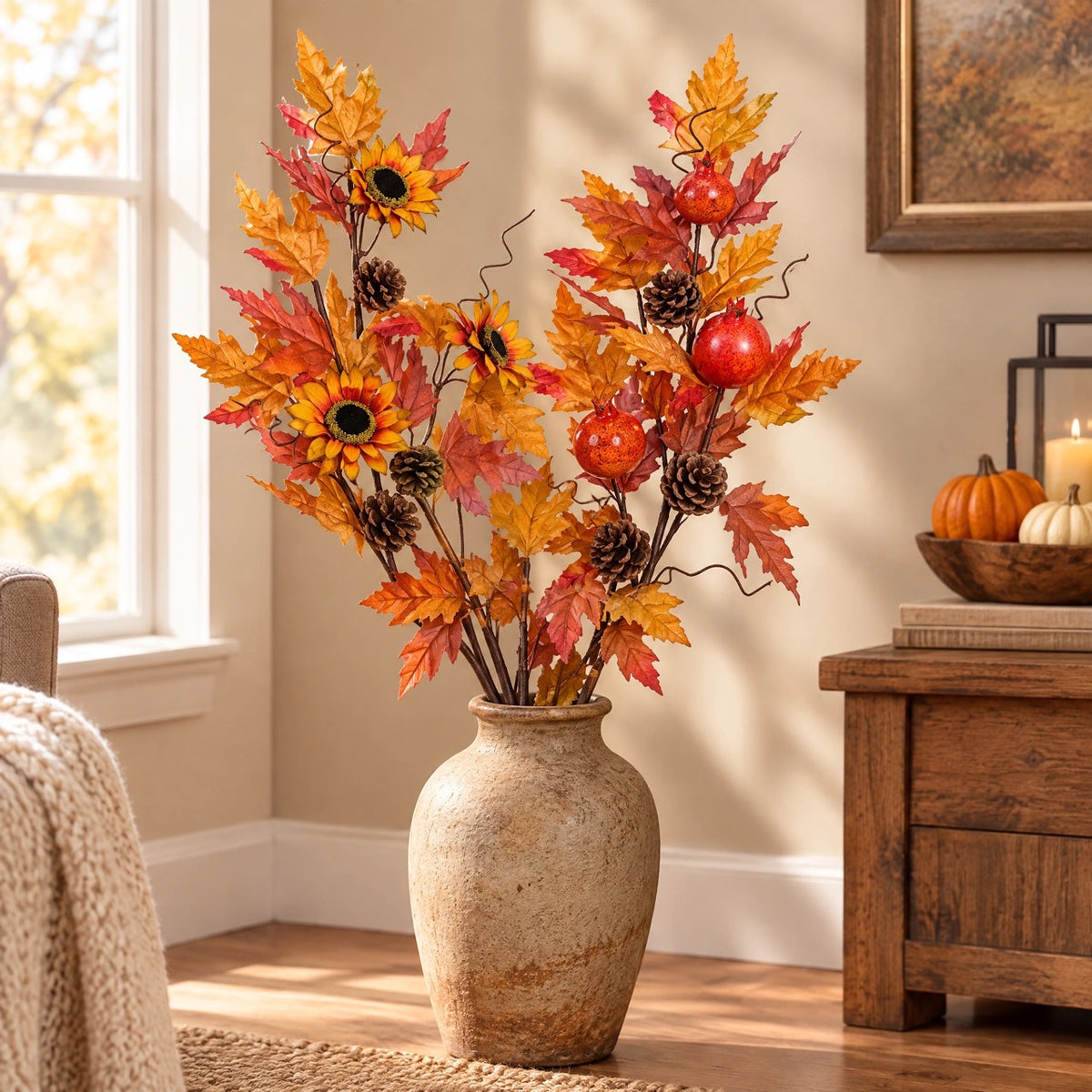 Autumn branches with sunflowers and pomegranates in a vase