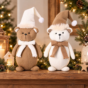 Standing winter bears in white and brown tones with hats and bows