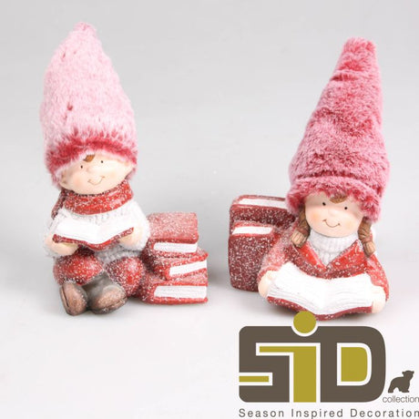 Vinterbørn læser i sneen