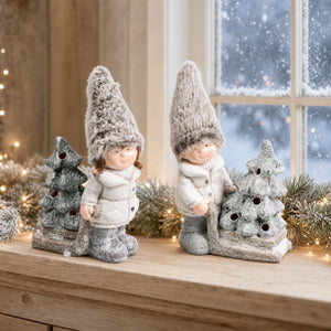 Winter children with Christmas trees