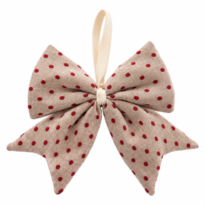 Beige bow with red dots