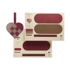 DIY red and gold woven-heart paper sheets in a bag from Juel & Brandt