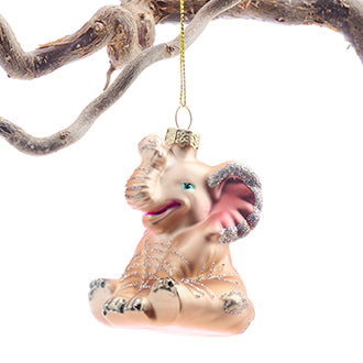 Glass Christmas bauble featuring a seated elephant from Pobra