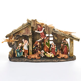 Nativity scene with straw roof and polyresin figures from Pobra