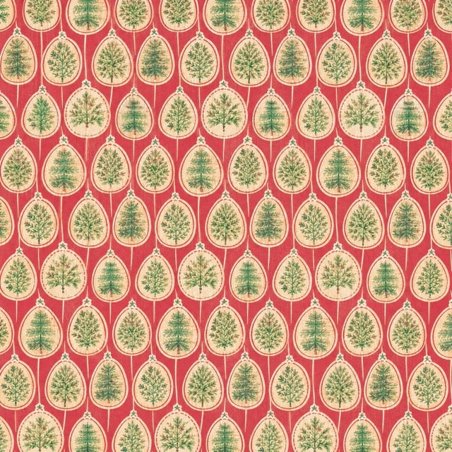 Christmas gift wrap featuring Christmas trees inside ornaments