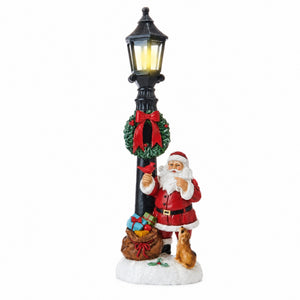 Lamp post with Santa Claus