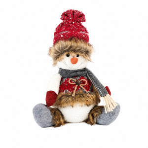 Sitting snowman with fine clothes