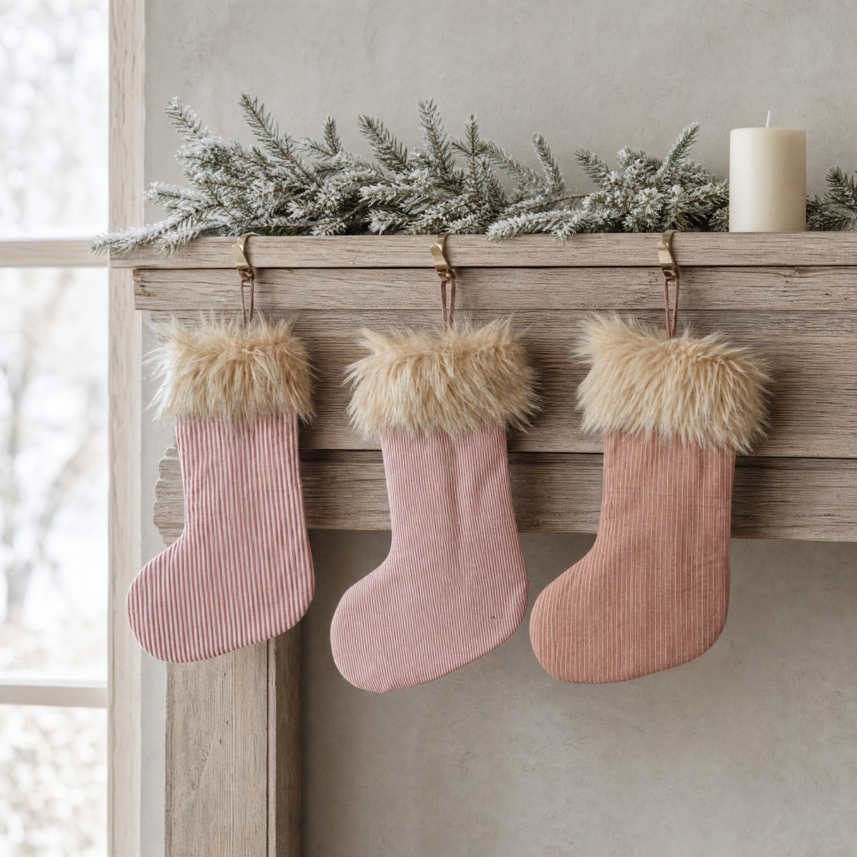 Striped Christmas stocking with faux fur trim