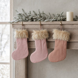 Striped Christmas stocking with faux fur trim
