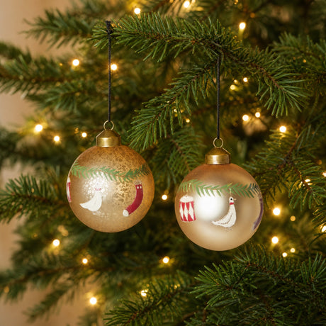 Christmas bauble with Christmas motifs, gold