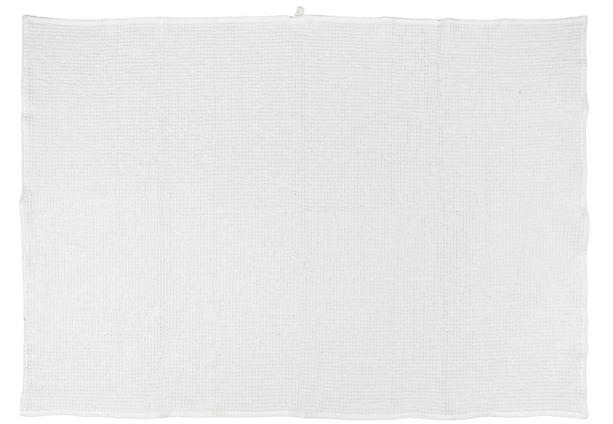 Close-up of white Liseleje towels by Ib Laursen with decorative waffle pattern