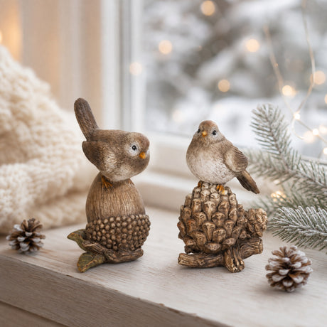 Bird sitting on pine cone/acorn