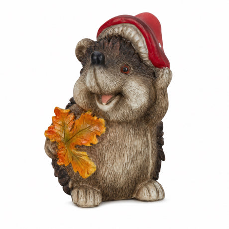 Hedgehog with autumn leaves