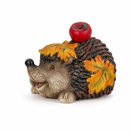Hedgehog with autumn leaves
