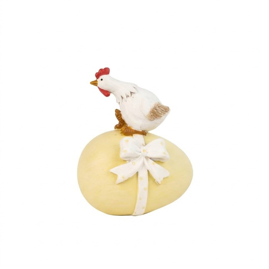 Easter egg with bow and chicken