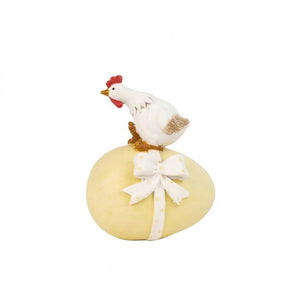 Easter egg with bow and chicken