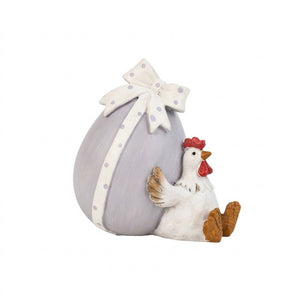 Easter egg with bow and chicken