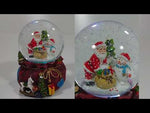 Snow globe Santa with gift sack