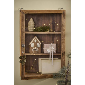 Honningkagehus til fyrfadslys med snefnug