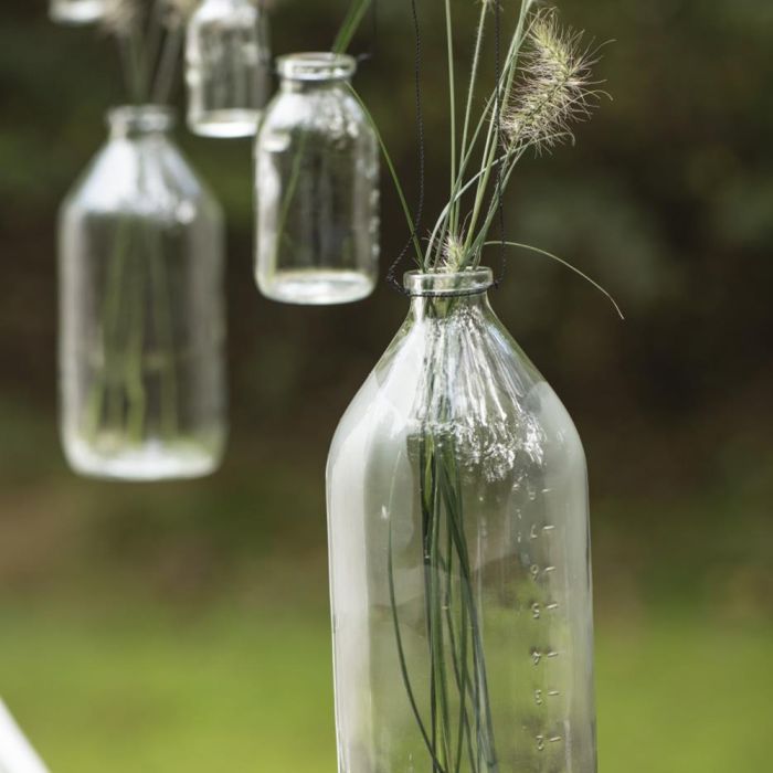 Ib Laursen glasflaske med metalwire 1000 ml med andre flasker fra samme serie